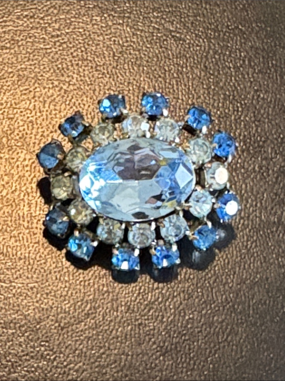 Petite vintage blue glass or crystal brooch, brass tone